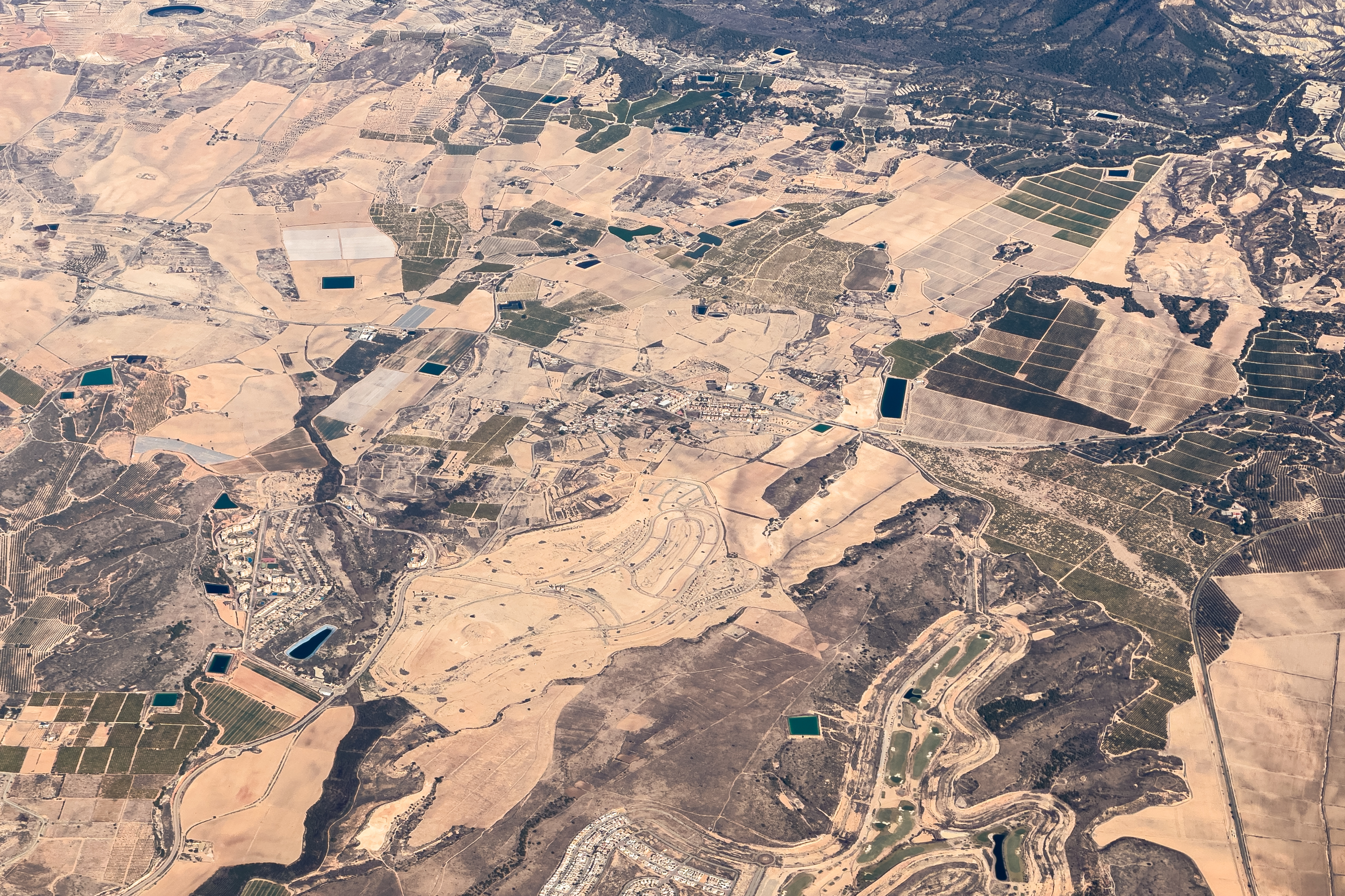 Image of 2 engineers sharing expertise to share holders