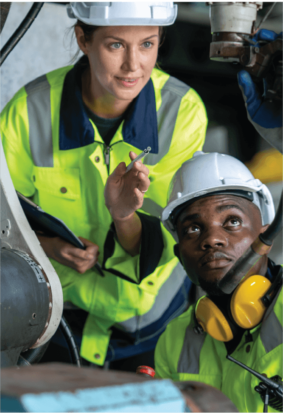 An image of a man and woman working in a processing team on a mine